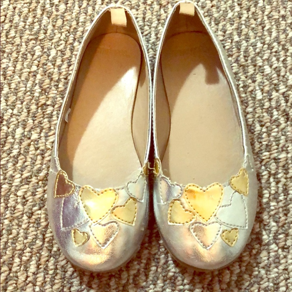 Silver shoes with gold hearts